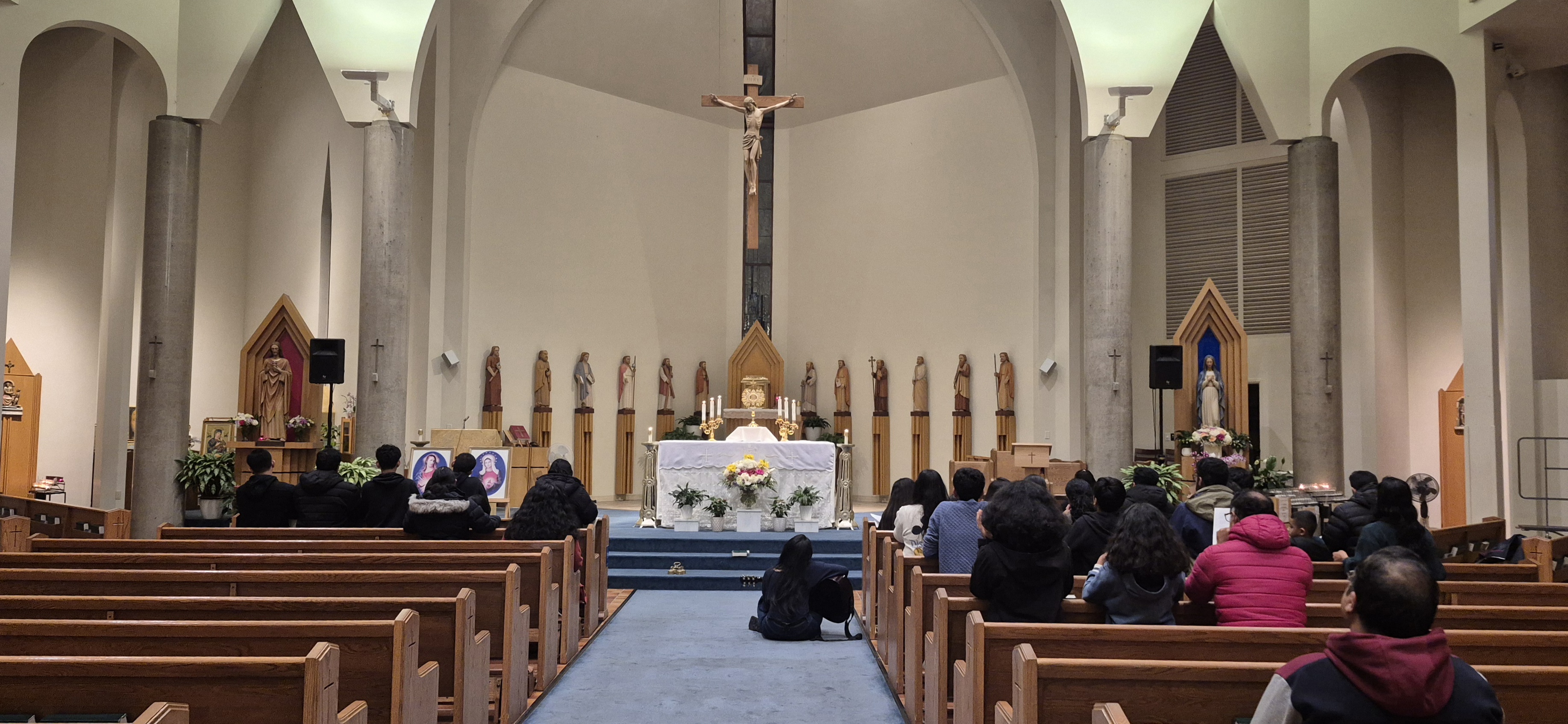 Community gathered in prayer at church